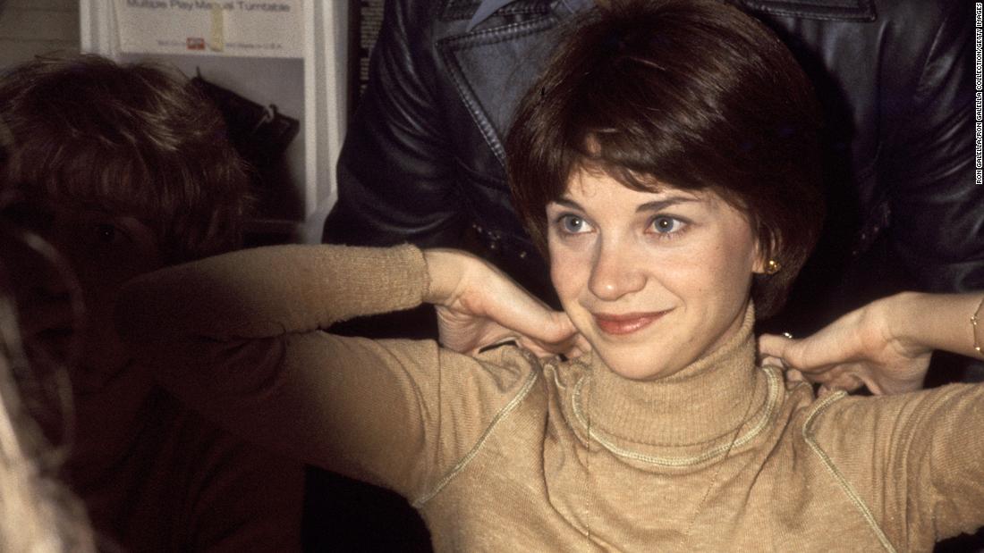 Williams is photographed at an autographing party at a Sam Goody store in New York City in 1976.