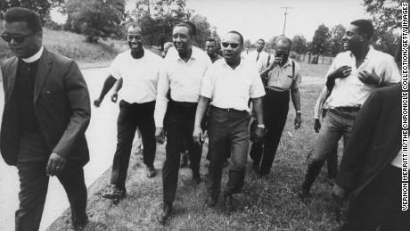 Civil rights leaders Floyd B. McKissick, Dr. Martin Luther King Jr. and Stokely Carmichael during march through Mississippi to encourage voter registration.