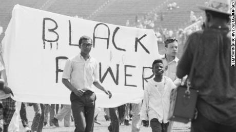 A group of teenagers carry a sign proclaiming &quot;Black Power&quot; during a civil rights rally in July 1966. 