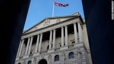 The Union Jack flag waves on top of the Bank of England in London, Thursday, Feb. 2, 2023. The Bank of England is expected to raise interest rates by as much as half a percentage point. That would outpace the latest hike by the U.S. Federal Reserve. The move on Thursday comes as the central bank seeks to tame decades-high inflation that has driven a cost-of-living crisis and predictions of recession. 