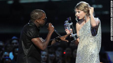 Kanye West jumps onstage as Taylor Swift accepts her award for the &quot;Best Female Video&quot; award during the 2009 MTV Video Music Awards at Radio City Music Hall on September 13, 2009 in New York City. 
