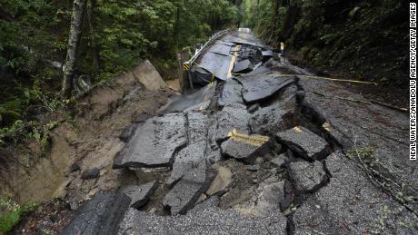 A road in in California&#39;s Santa Cruz Mountains was partially washed away by torrential rain caused by an atmospheric river. 