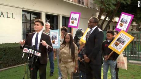 Christian Contreras, an attorney for one of Anthony Lowe&#39;s children, announces legal claim. 