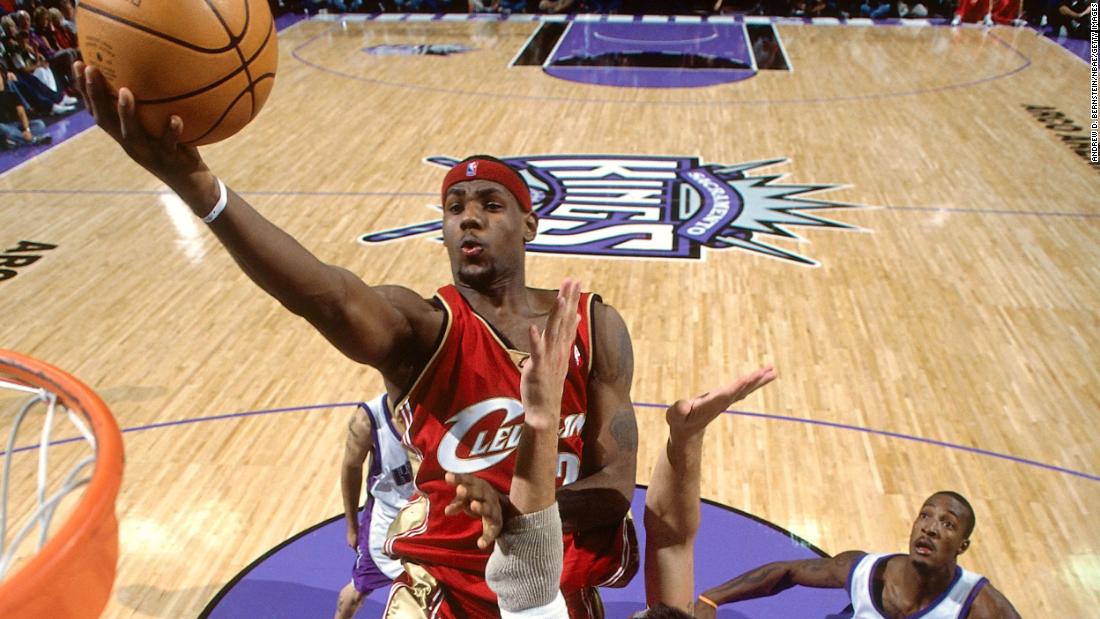 James goes up for a layup during his NBA debut on October 29, 2003. He scored 25 points in a loss at Sacramento. In his first season in the NBA, James won the league&#39;s Rookie of the Year Award.
