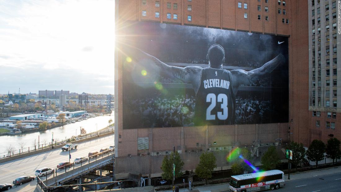 James appears on a Nike poster outside Cleveland&#39;s Quicken Loans Arena in October 2014, a few months after he announced that he would be returning to the Cavaliers as a free agent.