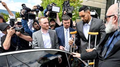 Australian tennis player Nick Kyrgios leaves the magistrate&#39;s court in crutches in Canberra on February 3, 2023.