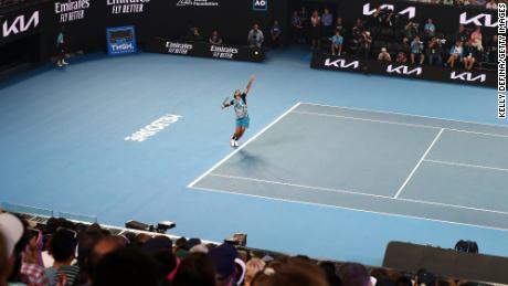 Australia's Nick Kyrgios serves in a charity match against Serbia's Novak Djokovic ahead of the Australian Open on January 13, 2023 at Melbourne Park.