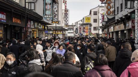 Shoppers in the Guanqian Street shopping area in Suzhou, Jiangsu province, on January 25, 2023. 