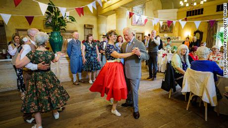 Charles gets involved during a tea dance hosted by The Prince&#39;s Foundation to mark the Queen&#39;s Platinum Jubilee, at Highgrove, near Tetbury, western England on May 31, 2022. 