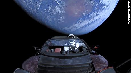 This February 8, 2018 handout photo from SpaceX shows the Tesla roadster after it launched atop a Falcon Heavy rocket with a dummy driver named &quot;Starman.&quot; (Photo by SpaceX via Getty Images)
