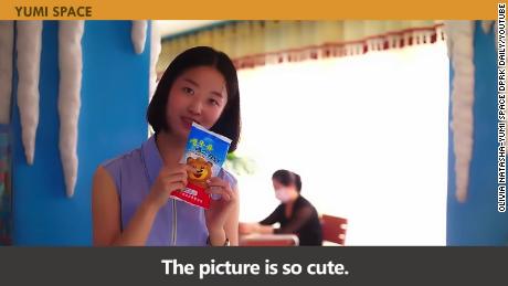 YuMi eats ice cream in Pyongyang, North Korea, in a YouTube video uploaded on August 1, 2022.