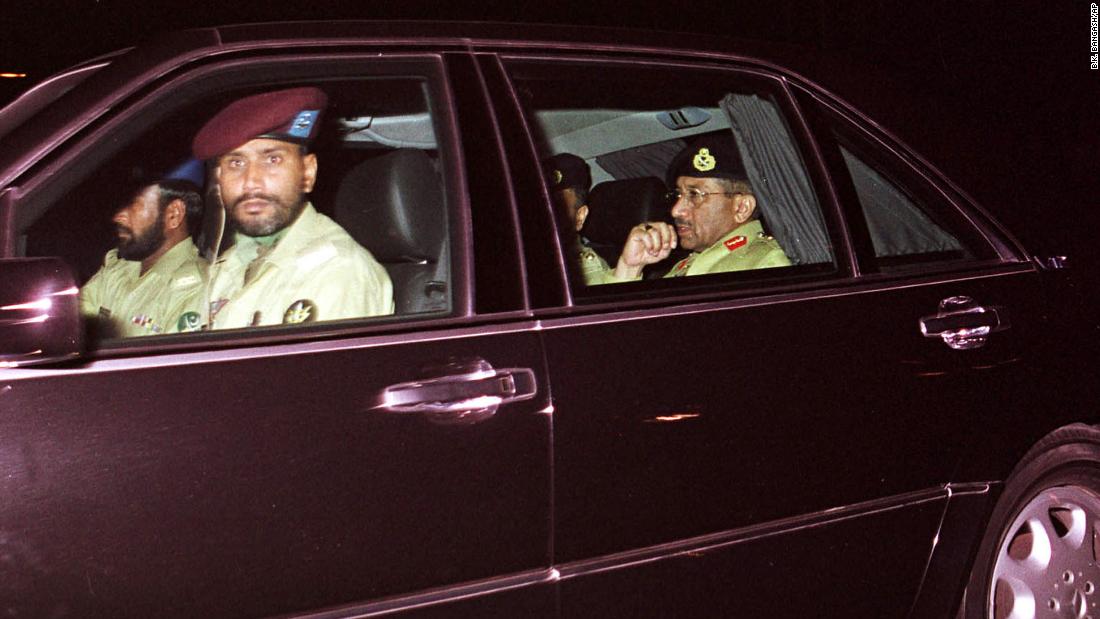 Musharraf, in the rear seat, arrives at the government television station in Islamabad, Pakistan, in October 1999 before addressing the nation. A week earlier, he led a coup against Prime Minister Nawaz Sharif and became head of government. 