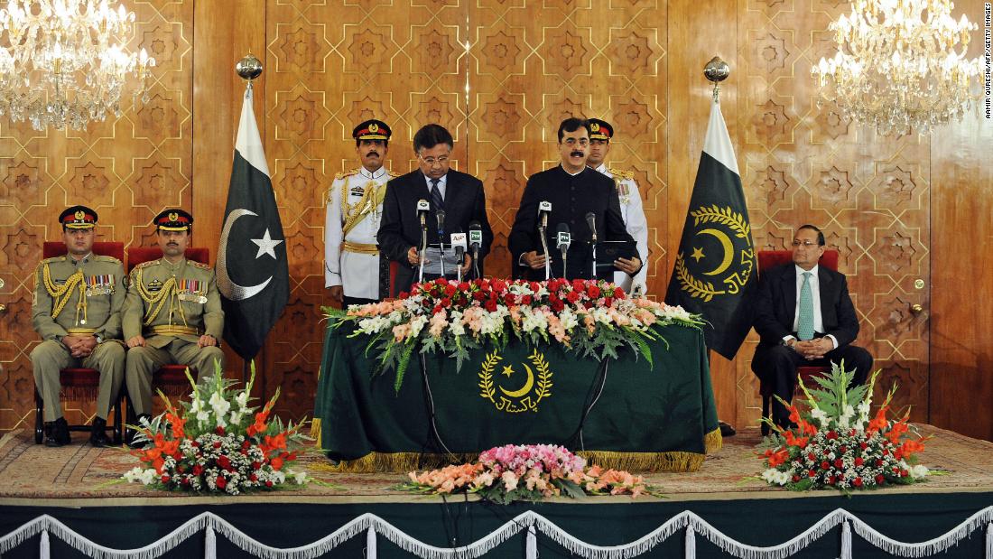 Musharraf administers the oath to newly elected Pakistani Prime Minister Yousuf Raza Gilani during a ceremony in Islamabad in March 2008. Under pressure from the West, Musharraf lifted the state of emergency and called elections a month earlier; his party fared badly.