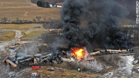 A Norfolk and Southern freight train that derailed Friday burns Saturday in East Palestine, Ohio.