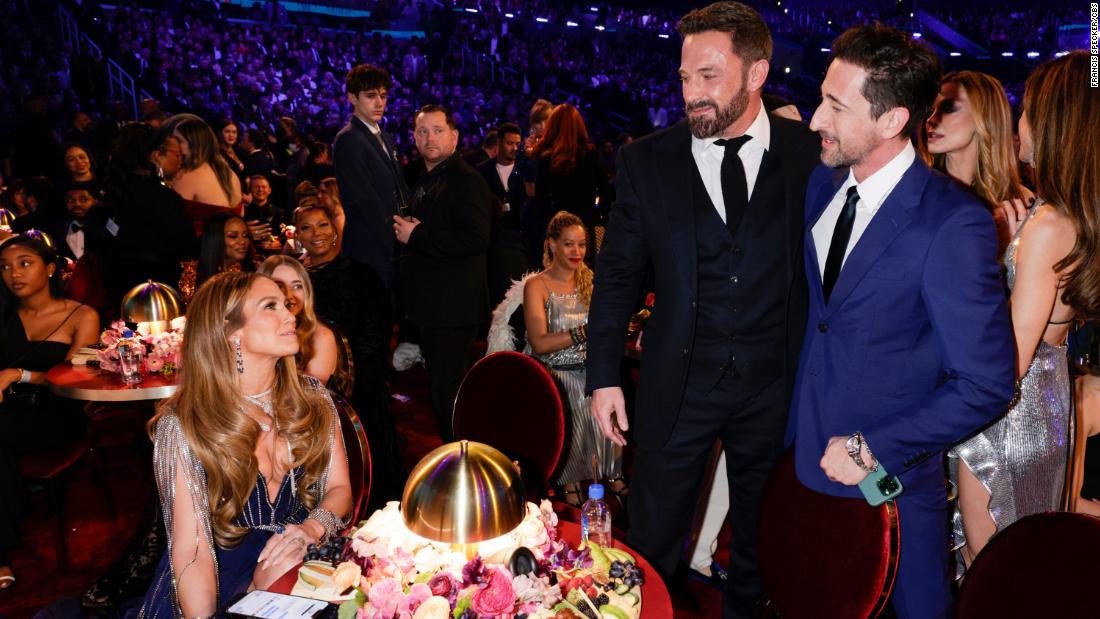 From left, Jennifer Lopez, Ben Affleck and Adrien Brody attend the show. &lt;a href=&quot;https://www.cnn.com/entertainment/live-news/grammy-awards-2023/h_941ccab490a19cd7fd10ba5cab9449e7&quot; target=&quot;_blank&quot;&gt;See more photos from behind the scenes&lt;/a&gt;.