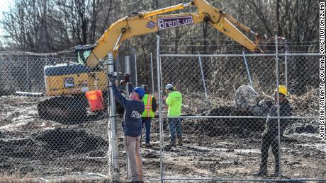 Law enforcement and construction crews were seen on Monday at the future site of the $90 million police training facility.