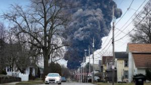 A black plume rises over East Palestine, Ohio, as a result of a controlled detonation of a portion of the derailed Norfolk and Southern trains Monday, Feb. 6, 2023. (AP Photo/Gene J. Puskar)