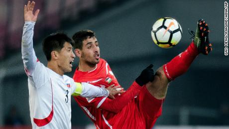 Oday Dabbagh, who plays club football in Portugal, is pictured playing for the
Palestinian national team against Song Kum Song of North Korea during the 2018 AFC Under-23
Championship in Jiangyin city, east China&#39;s Jiangsu province, in January 2018.