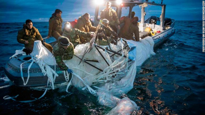 US Navy sailors recover the balloon off the coast of Myrtle Beach, South Carolina, on Sunday.