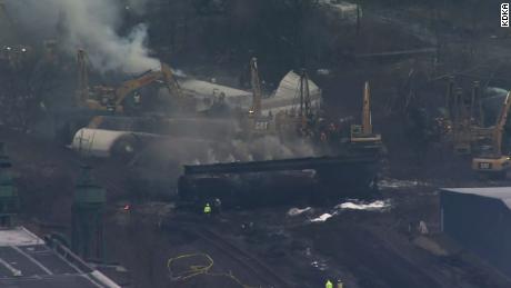 5 derailed train cars carrying hazardous material at risk of exploding are no longer burning