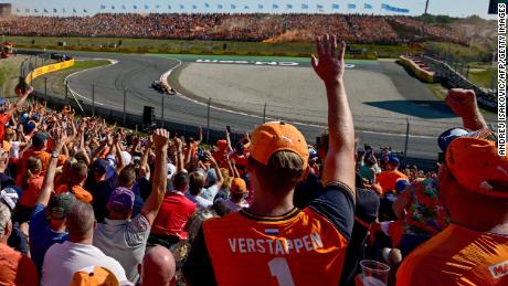 Spectators react as Verstappen drives ahead of the Dutch Formula One Grand Prix at the Zandvoort circuit on September 3, 2022.