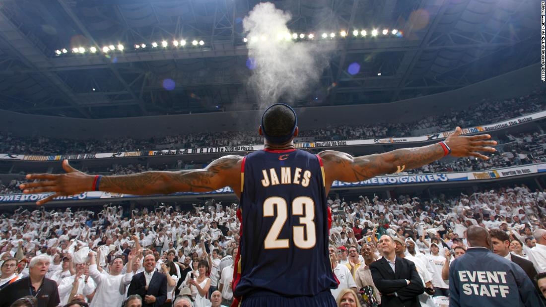 LeBron James does his chalk toss ritual before a game in 2008. Basketball players use chalk to help them grip the ball better.
