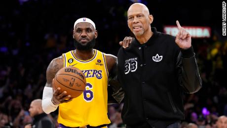 James (left) poses with Kareem Abdul-Jabbar after becoming the NBA&#39;s all-time leading scorer this week. 