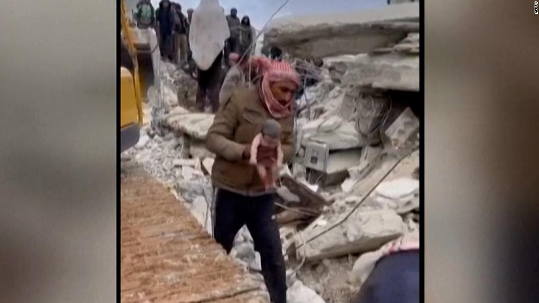 Newborn still tied to mother pulled from rubble