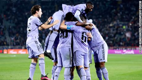 Real Madrid&#39;s players celebrate a goal against Al Ahly. 