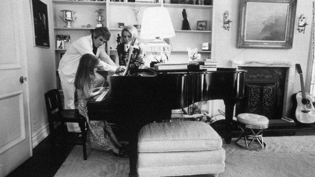 Bacharach and Dickinson watch their daughter Nikki play the piano in 1974. Bacharach and Dickinson divorced in 1980.