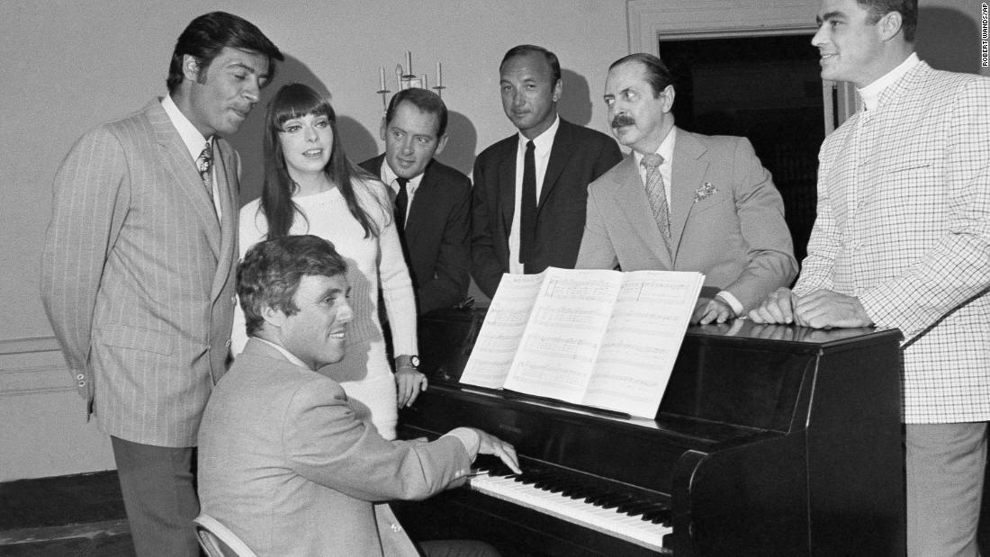 Bacharach plays the piano at the first rehearsal of his first Broadway musical, &quot;Promises, Promises&quot; in 1968. Joining Bacharach, from left, are actors Jerry Orbach and Jill O&#39;Hara, director Robert Moore, author Neil Simon, producer David Merrick and actor Edward Winter.