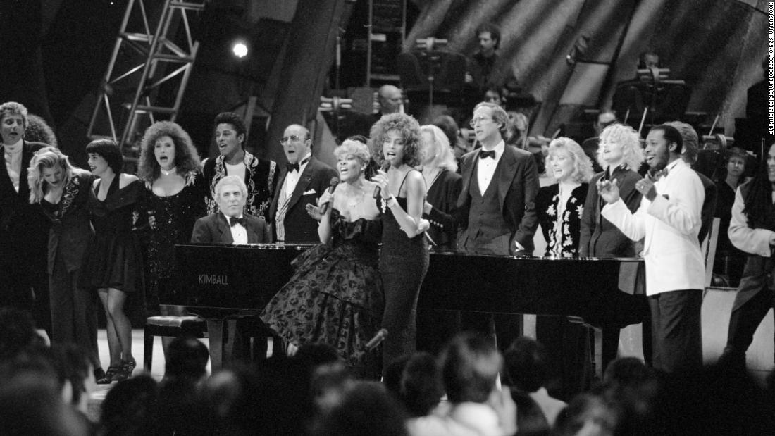 Bacharach plays with Warwick and Whitney Houston in 1990.