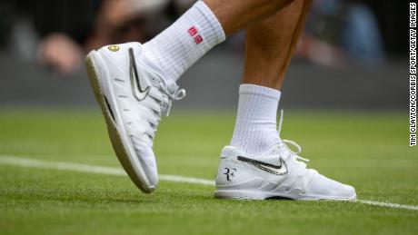 Federer sports Nike tennis shoes on Wimbledon&#39;s Centre Court in July 2019. 