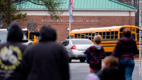 Families of 2 students in Virginia school where 6-year-old student shot his teacher notify district of potential legal action, attorneys say
