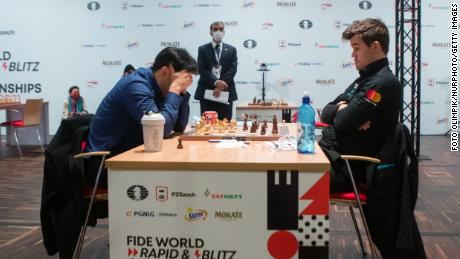 Nakamura (left) and Carlsen (right) during the FIDE Chess World Rapid and Blitz Championship in Warsaw, Poland in 2021.