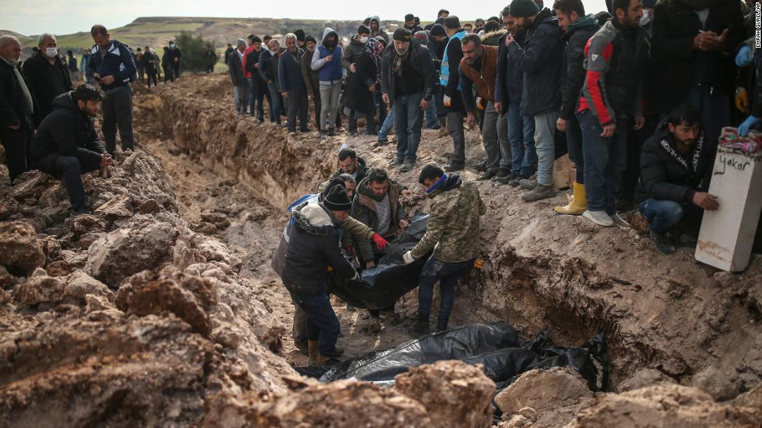 People bury earthquake victims in Adiyaman, Turkey, on February 10.