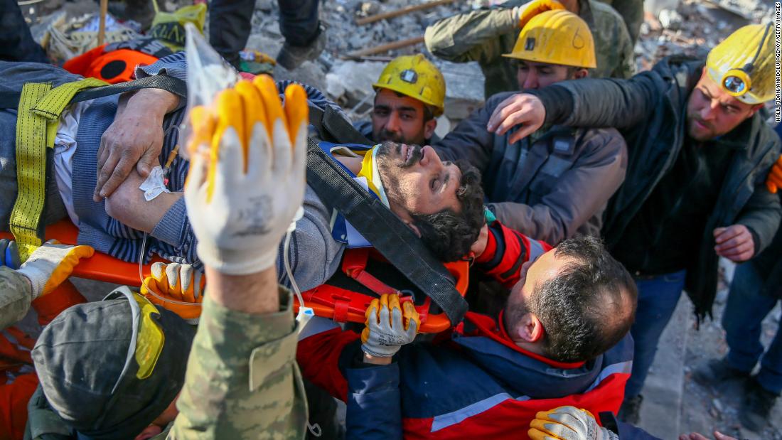 Sezai Karabas is put on a stretcher after being rescued from rubble in Gaziantep, Turkey, on February 11. Karabas&#39; young daughter Sengul was also rescued. 