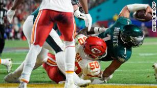 Kansas City Chiefs cornerback Jaylen Watson (35) celebrates an interception  against the Jacksonville Jaguars during an NFL Divisional Playoff football  game Saturday, Jan. 21, 2023, in Kansas City, Mo. (AP Photo/Ed Zurga