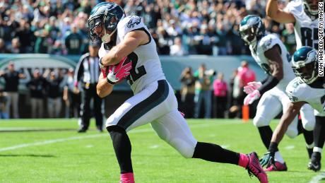 Safety Chris Maragos of the Philadelphia Eagles scores a touchdown against the St. Louis Rams on October 5, 2014.