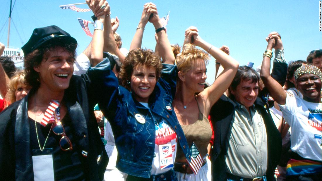 Welch, second from left, joins other celebrities during a &quot;Hands Across America&quot; fundraising event in 1986.