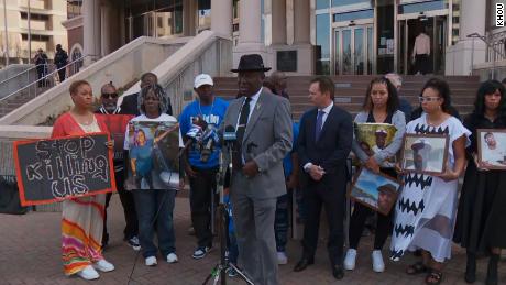 Families of men who died in custody at a Houston jail demand Justice Department probe of the facility