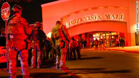 Law enforcement members gather outside the Cielo Vista Mall after a shooting, in El Paso, Texas, on February 15. On Friday, police said a legally armed civilian shot and wounded the suspect.