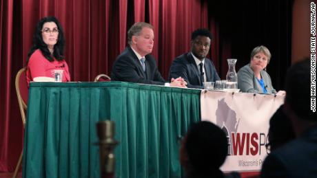 Wisconsin state Supreme Court candidates, from left, Jennifer Dorow, Dan Kelly, Everett Mitchell and Janet Protasiewicz participate in a candidate forum in Madison on January 9. 