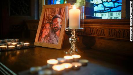 Candles illuminate a photo of missing woman Nicola Bulley and her partner, Paul Ansell, at St Michael&#39;s Church in St Michael&#39;s on Wyre.