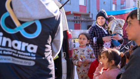 INARA workers hand out aid in Turkey to earthquake survivors.