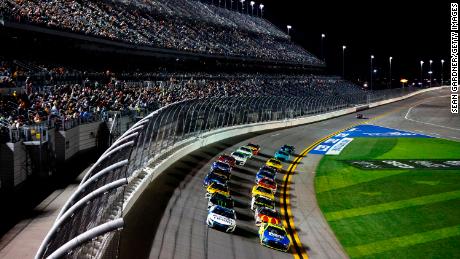 Drivers battle in one of the Daytona 500 qualifying races Thursday. NASCAR&#39;s 75th season officially kicks off at the 2.5-mile Daytona International Speedway on Sunday.