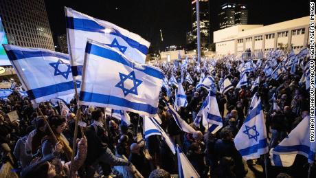A protest unfolds Saturday in Tel Aviv against the proposed judicial overhaul by Israeli Prime Minister Benjamin Netanyahu&#39;s government.