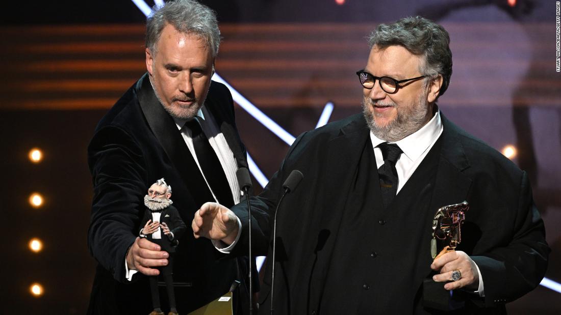 Mark Gustafson and Guillermo del Toro accept the animated film award for &quot;Guillermo del Toro&#39;s Pinocchio.&quot;