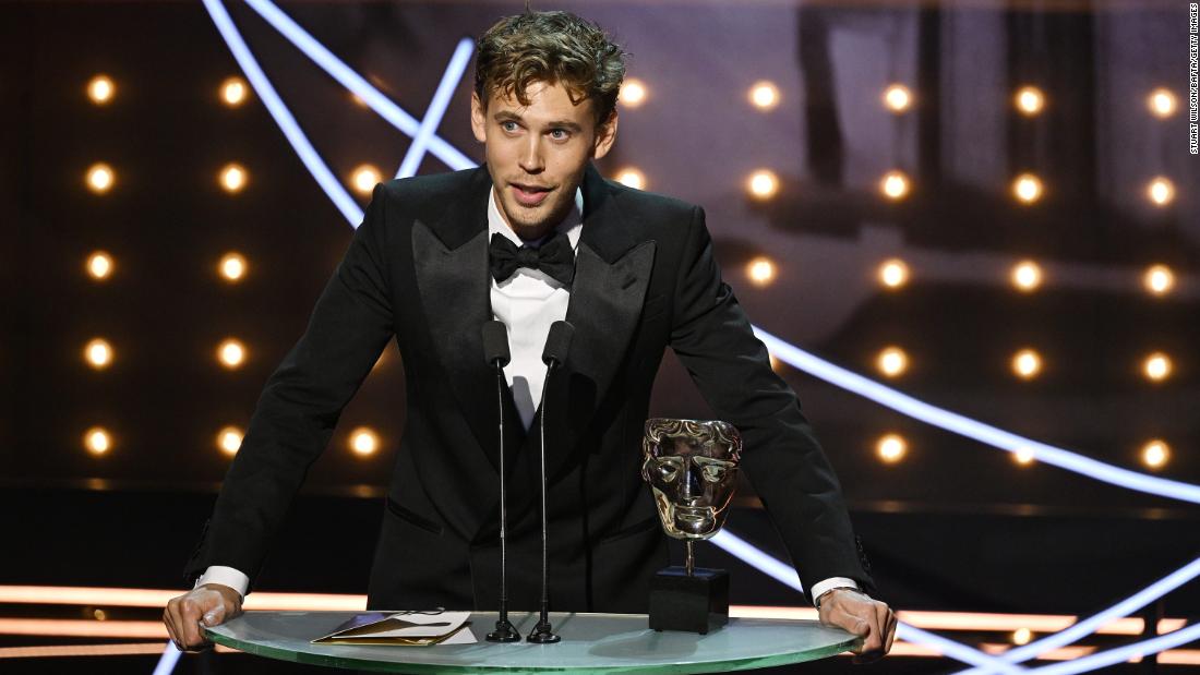 Austin Butler accepts the leading actor award for his performance in &quot;Elvis&quot; on Sunday, February 19, in London.  