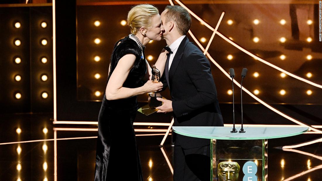 Cate Blanchett accepts the leading actress award from Taron Egerton. 